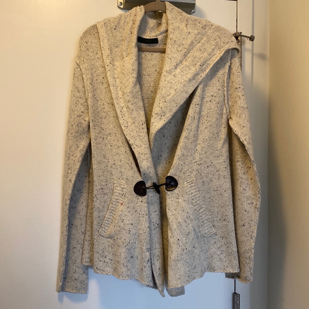 Womens sweater with leather clasp